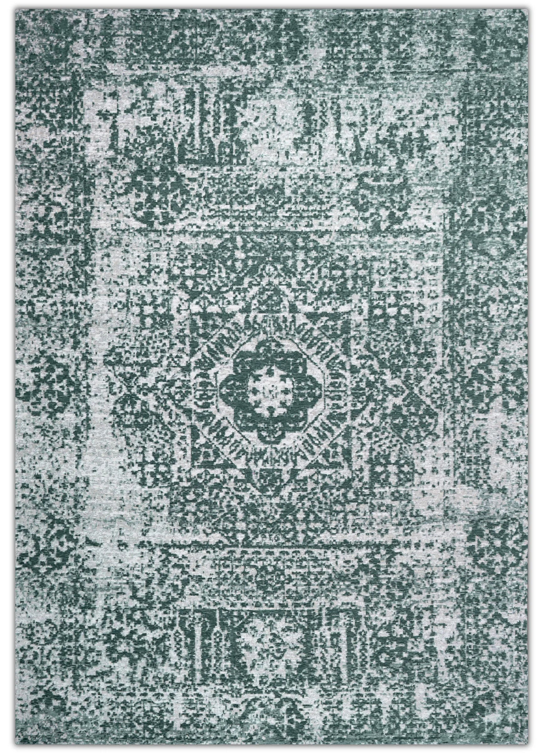 Patterned rug with a geometric design in shades of green and gray.