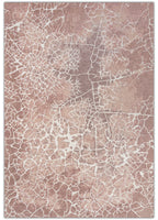 Textured pink and beige area rug with a subtle pattern