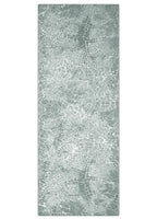 Rectangular rug with a textured pattern on a white background