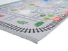 Rugaroos Round the Town Kid's Machine Washable Play Rug | Train tracks surrounding Downtown on Light Gray | Corner Close-up | 4x6 | Mother Ruggers | Washable Rugs | Kid's Rugs | Eco Friendly Rug| Pet Friendly | Kid Friendly | Machine Wash | Line Dry | Bedroom | High-Traffic | Two-year warranty with proper care | Shake or light Vacuum | Machine Wash as needed | Dry Flat or Line Dry | Dries fast | Hand Drawn - Digitally Printed | Velvet | Easy- Clean